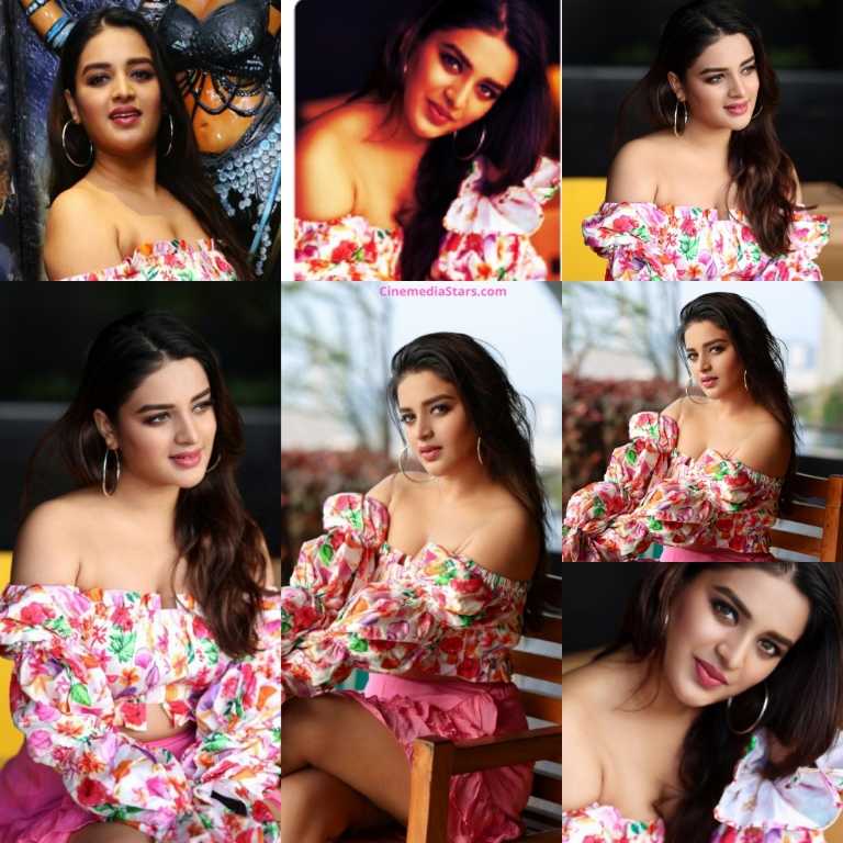 Actress Nidhhi Agerwal Pretty beautiful in Off shoulder Pink Outfit for the Inauguration of Restaurant